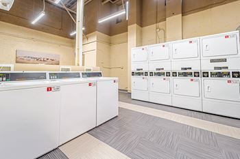 a row of white utility cabinets in a building  at Idaho Terrace, Washington, DC